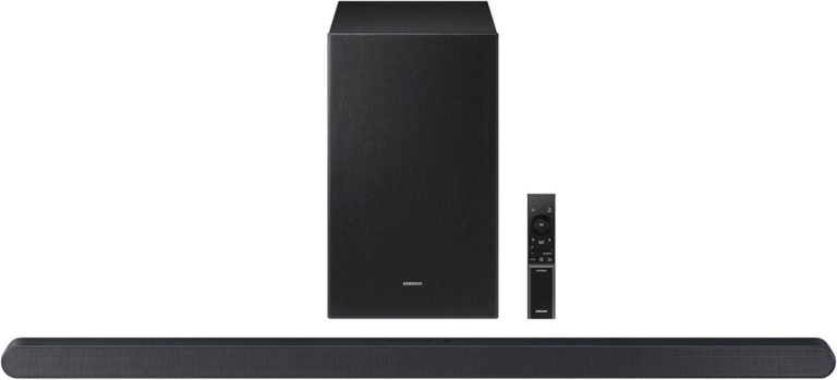 Samsung HW-S700D Ultra Slim 3.1ch soundbar in Titan Black with a wireless subwoofer, featuring a near-flush wall-mount design.